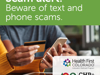 Focus on hands of Woman in café holding credit card and mobile phone next to Health First Colorado and Child Health Plan Plus logos with text reading: Scam alert! Beware of text and phone scams.